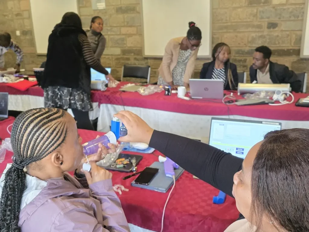 ATS Kenya 2025 woman inhaling